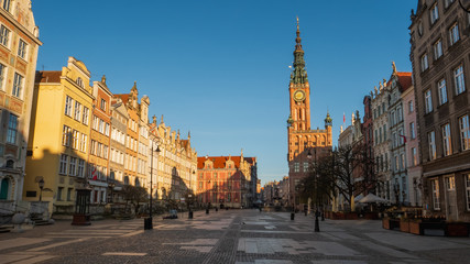 Fototapeta na wymiar The Main Town Hall at Long Market Street on Royal Route in Old Town of Gdansk, Poland. Spring, sunrise.