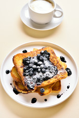 French toasts with blueberry sauce