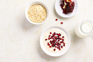 Obraz na płótnie Canvas Pomegranate oatmeal porridge
