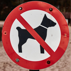 Dogs forbidden, sign with a crossed out pictogram of a dog as a sign that no dogs are wanted here.