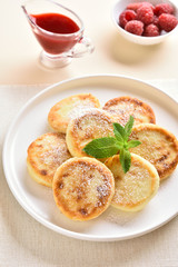 Cottage cheese pancakes with fresh raspberries