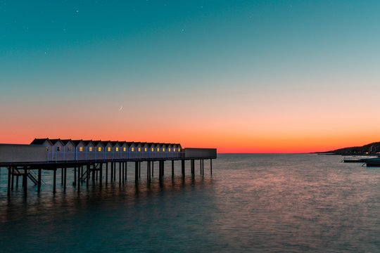 P&aring;lsj&ouml;baden sauna houses at sunset in Helsingborg, Sweden