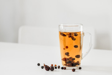 Vitamin Natural tea from the dried rosehips for immunity handmade at home in a light interior