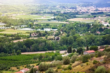 Views of Languedoc-Roussillon from village Eus, France. Tiled roof houses, vineyards and mountains...