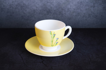 cup of coffee on wooden table