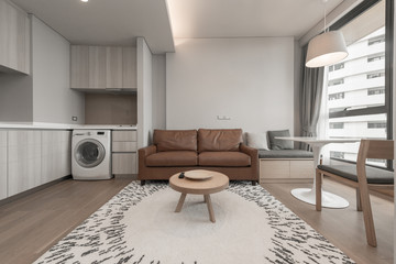 Spacious white and wooden living room with modern 