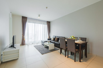 Spacious white and wooden living room with modern 