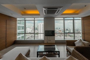 Spacious white and wooden living room with modern 