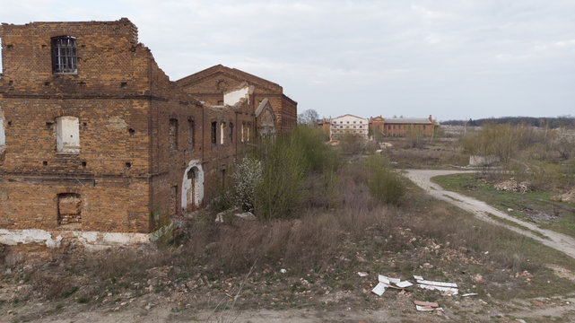 Old abandoned sugar factory in Viinitsia region, aerial view. Broken old factory. Destroyed house