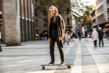 skateboarding woman in Cologne city