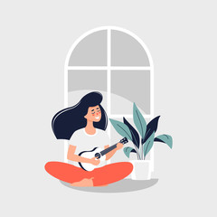 Vector illustration of young brunette woman sitting in lotus position on the floor and playing the guitar by a potted plant at home.
