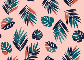 Vector seamless tropical pattern with monstera and palm leaves on a light pink background