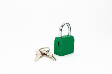 small lock with a key on a white background