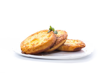 round bread croutons fried in batter in a plate