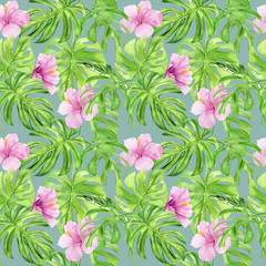 Watercolor illustration seamless pattern of tropical leaves and flower hibiscus. Perfect as background texture, wrapping paper, textile or wallpaper design. Hand drawn