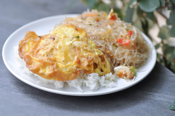 stir fried vermicelli and fried egg with rice