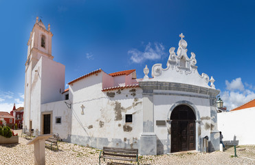 view to church in village of Alcantarilha in Portugal, Algarve region