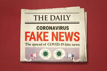 Stock photo of a newspaper cover with fake news about the coronavirus