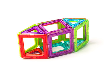 Children's toy magnetic designer, isolated on white background. close-up