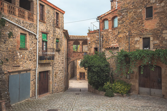 cityscape old buildings in spain near pubol castle
