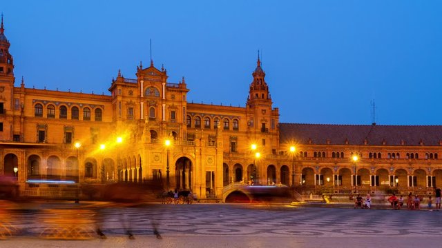 Seville, Spain. View of Spanish Square one of the best examples for Spanish architecture in Seville, Spain. Time-lapse at night with illumination, panning video