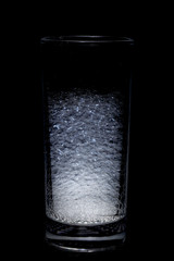 Foam bubble from soap or shampoo washing isolated on a glass