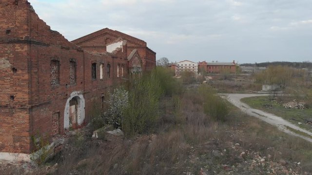 Old abandoned sugar factory in Vinnitsia region, aerial view. Broken old factory. Destroyed house