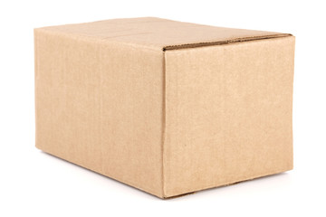 Concept of delivery, package, storage. Closed cardboard box on a white isolated background. Close-up. Mock-up.