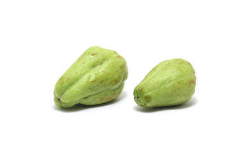 Two bitter melons/bitter gourds (Momordica charantia) isolated on white background