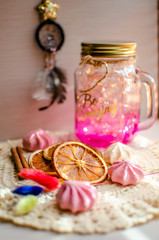 Fototapeta na wymiar Pink jar and garland lights