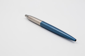 Ball point pen with metal housing
