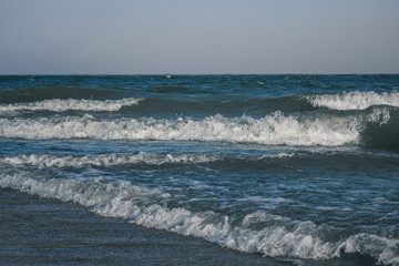 Sea waves with white foam