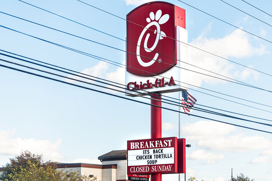 Beckley, USA - October 17, 2019: City during day with closeup of Chick-fil-A sign and breakfast chicken tortilla soup
