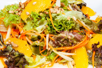 Warm salad of vegetables and meat. Close-up shot on a table in a restaurant.
