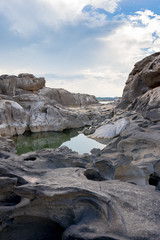 Thailand grand canyon (sam phan bok) at Ubon Ratchathani, Thailand.
Beautiful landscape of holes and rock mountain with river.