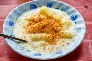 Cooked tapioca and coconut milk ( khoai mi nuoc cot dua ). Vietnamese food