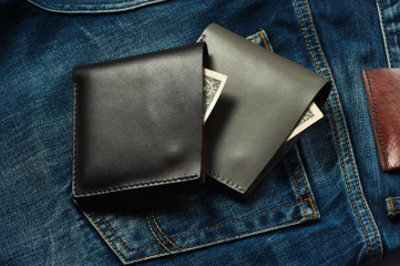 Wallet with money in a brown jeans pocket