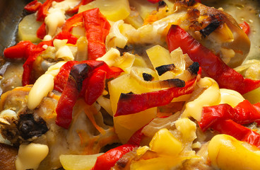 Chicken meat with potatoes and pepper on dinner