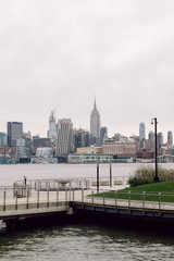 Fototapeta premium April 20 2020 - Hoboken NJ: waterfront pier closed due to the COVID-19 Coronavirus outbreak. The parks are close to increase social distancing and prevent people from getting close