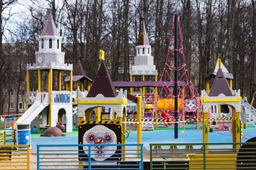 the playground is covered with a signal tape epidemic coronovirus COVID19. all small children are quarantined at home