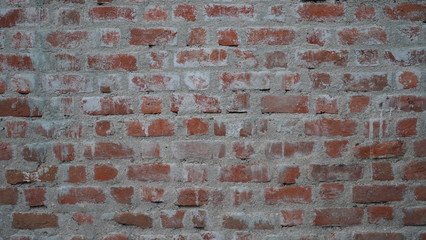 old brick wall with graffiti