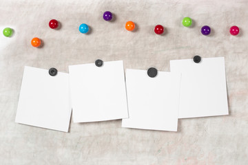 Blank polaroid photo frame with soft shadows and  magnet tape isolated on grey paper background as...