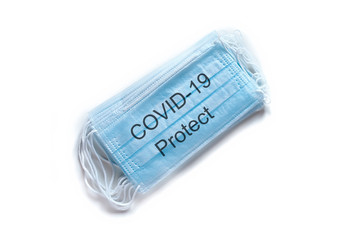 Medical mask COVID-19 PROTECT. Coronavirus COVID-19 pandemic. Medical protective masks isolated on...