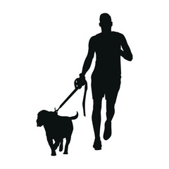 The silhouette of a man takes his dog walking