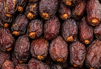Dried fruit, dried dates as a background
