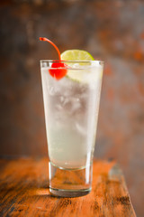 Rum collins cocktail (variation of traditional Tom collins). Selective focus. Shallow depth of field.

