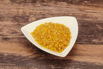 Vegetarian cuisine - dry bulgur for cooking