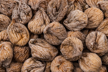 Delicious dried figs as a background