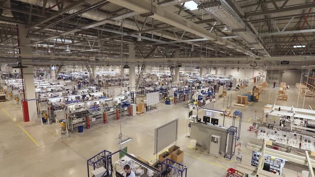 High-tech equipment and equipment in a sterile factory room for the production of high-tech automotive and jet modules and high-end components. panorama