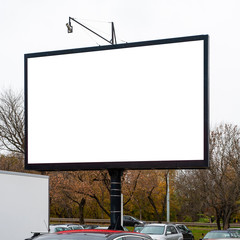 Blank white advertising display device on the car park